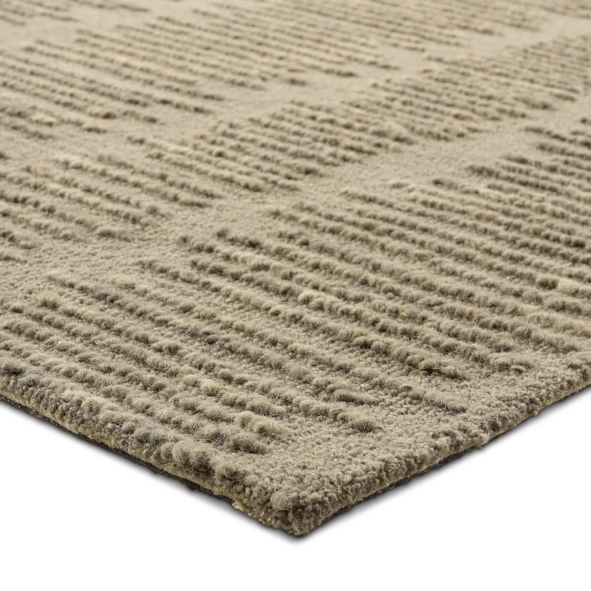 Finnigan FGN08 Rug by Jaipur Living in taupe. Made from 100% wool in a unique style.