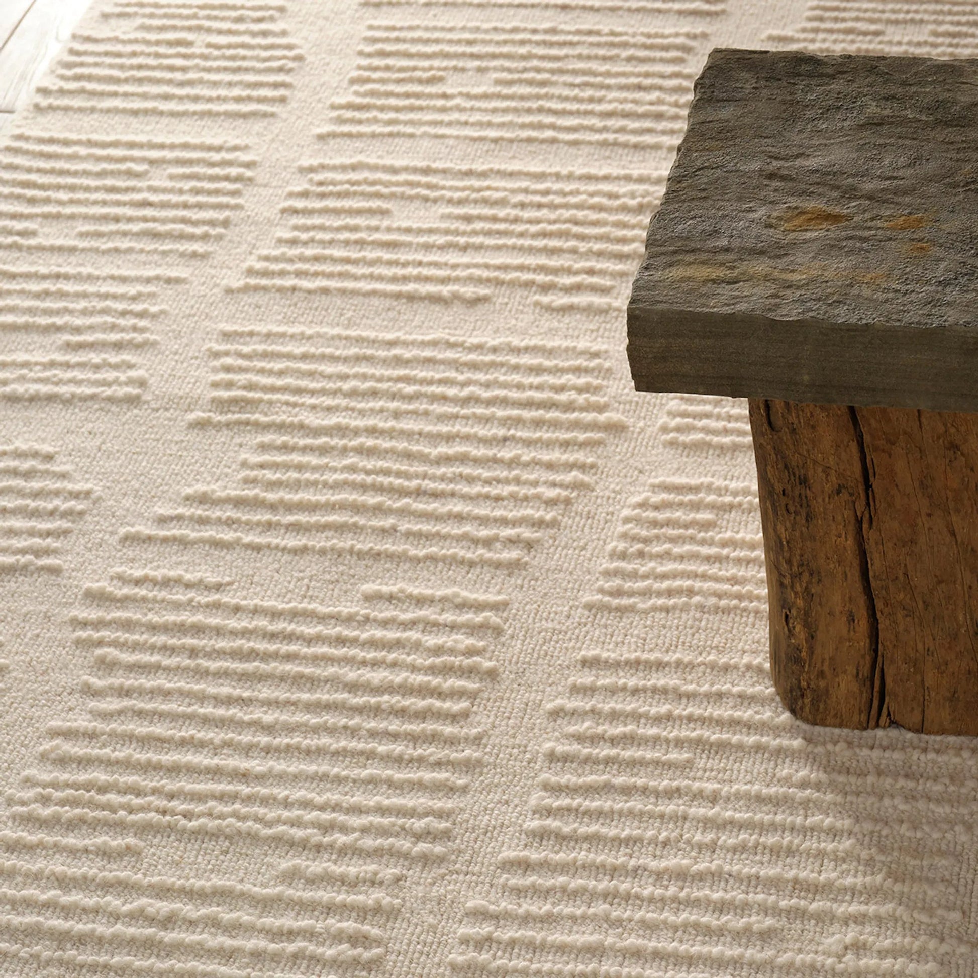 Finnigan FGN09 Rug by Jaipur Living in sand, cream. Made from 100% wool in a unique style.