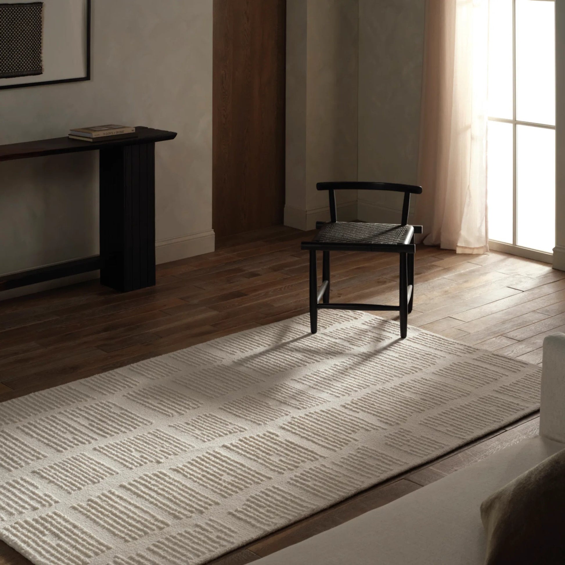 Finnigan FGN09 Rug by Jaipur Living in sand, cream. Made from 100% wool in a unique style.