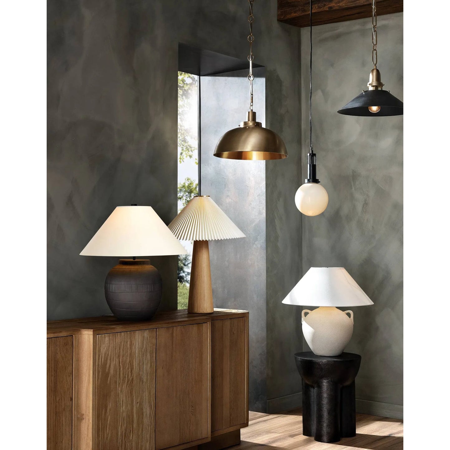 034 SI-2092945 | Lifestyle | Nicholls Tapered Pendant by Four Hands in black aluminum enamel, cast brushed brass. Made from aluminum, brass, thermoplastic in a modern style.