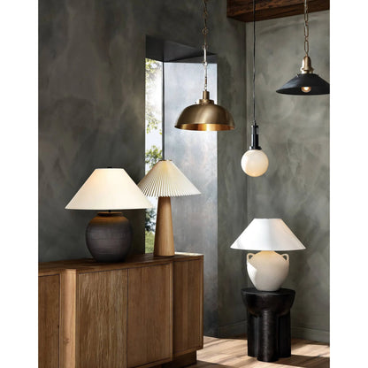 Nicholls Tapered Pendant by Four Hands in black aluminum enamel, cast brushed brass. Made from aluminum, brass, thermoplastic in a modern style.