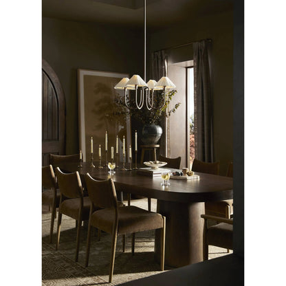 Valen Dining Table by Four Hands in rustic brown oak veneer. Made from oak veneer in a traditional style.