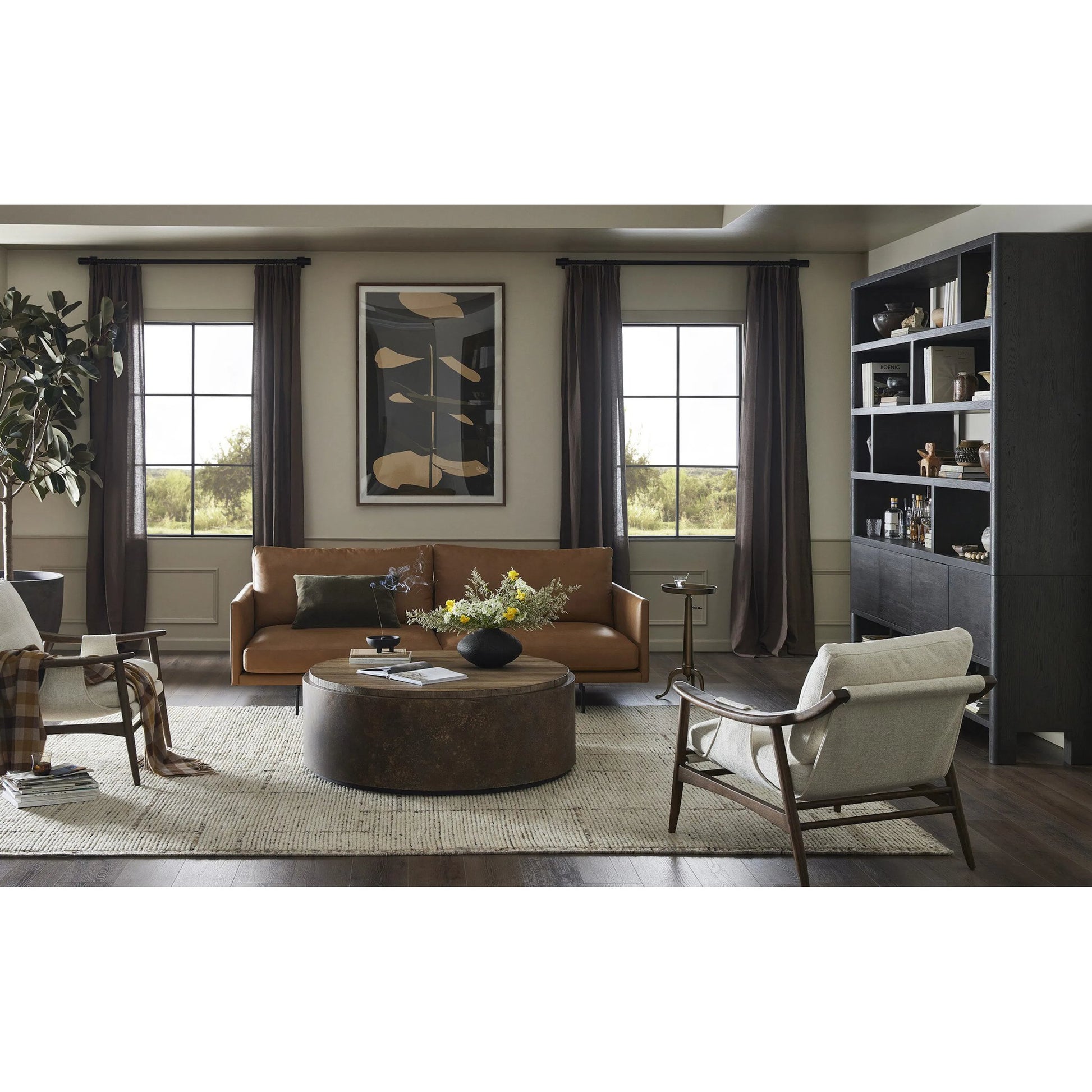 Noeline Wide Bookcase by Four Hands in smoked black oak, smoked black oak veneer. Made from solid oak, engineered hardwood, thick oak veneer in a modern style.