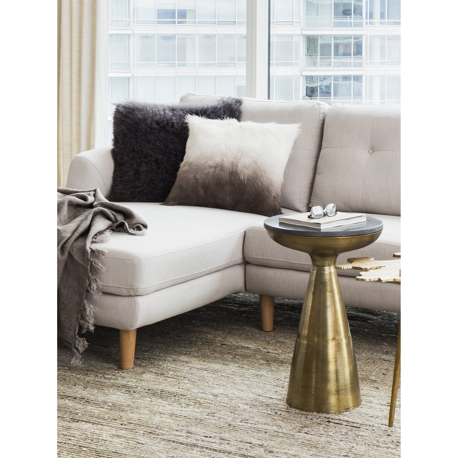 Font Side Table by Moe's Home Collection in brass and unfinished. Made from aluminum in a eclectic & global style.