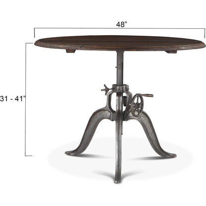 Artezia Adjustable Table by World Interiors in brown and weathered gray, gunmetal. Made from teak wood, iron in a rustic style.