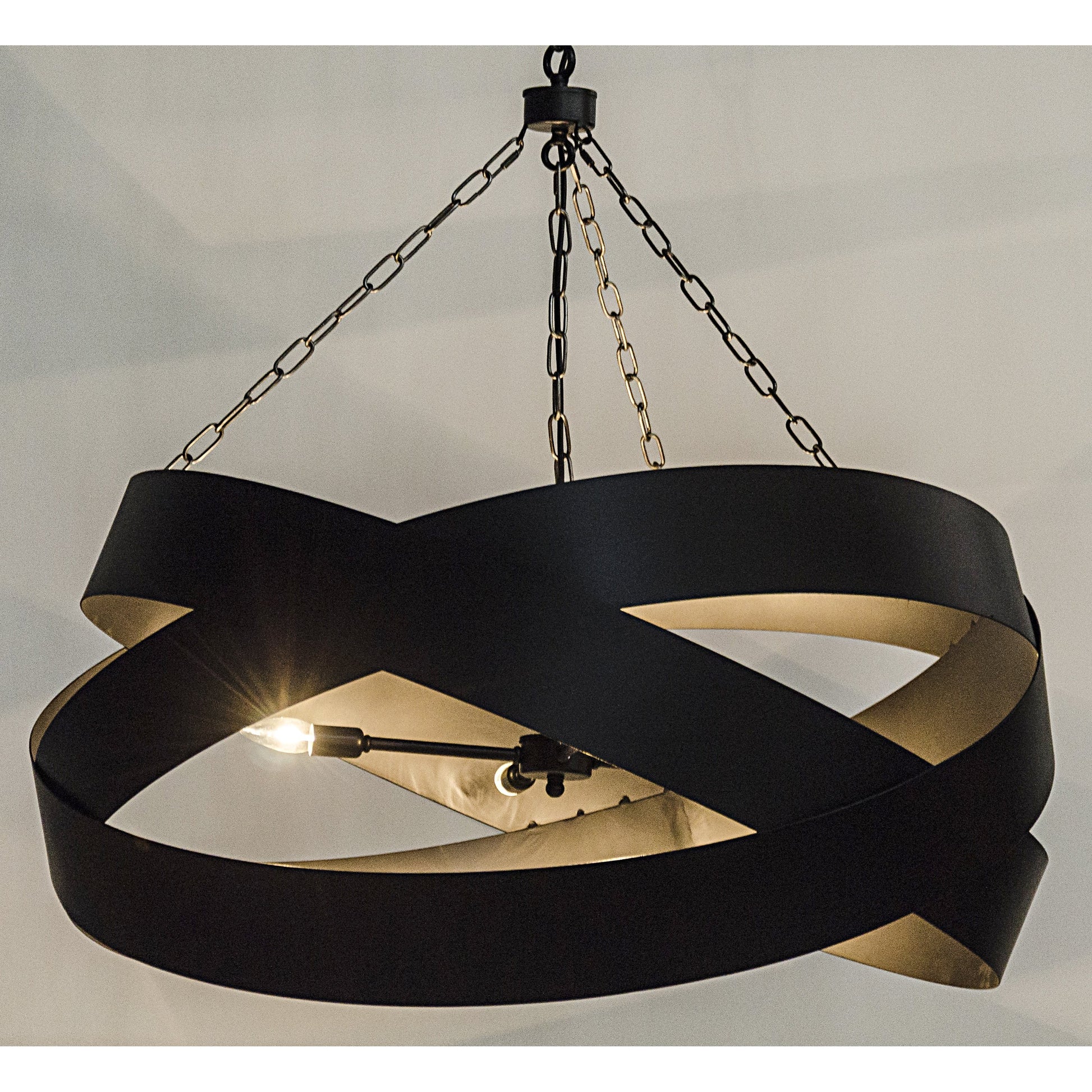 Orion Pendent by Noir in antique brass. Made from metal in a modern style.