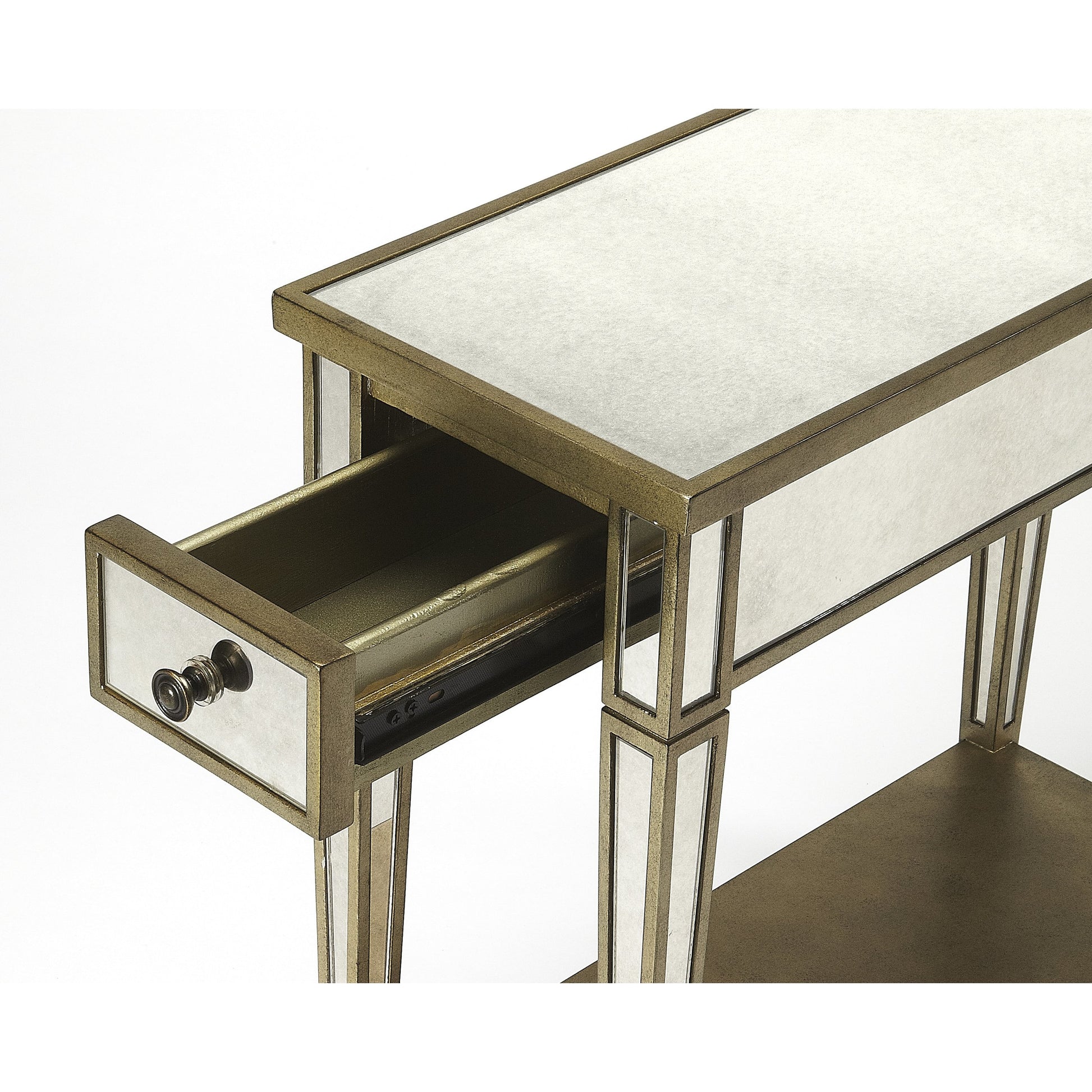 Celeste Mirrored Chairside Table by Butler Specialty Company in silver and mirror. Made from poplar hardwood solids, mdf, mirrored glass in a traditional style.
