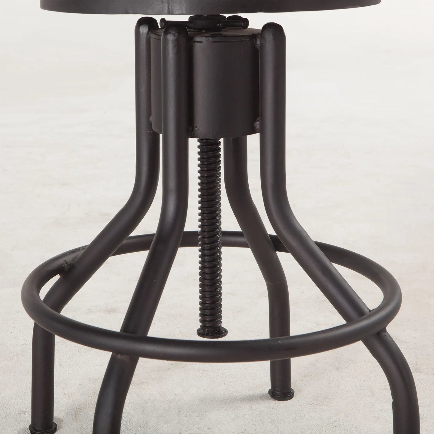 005 SI-2445252 | Closeup | Artezia Height Adjustable Stool by World Interiors in walnut, antique zinc. Made from acacia wood, iron in a traditional style.