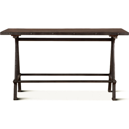 Paxton Gathering Table by World Interiors in brown and natural, gray zinc. Made from teak wood, iron in a modern style.