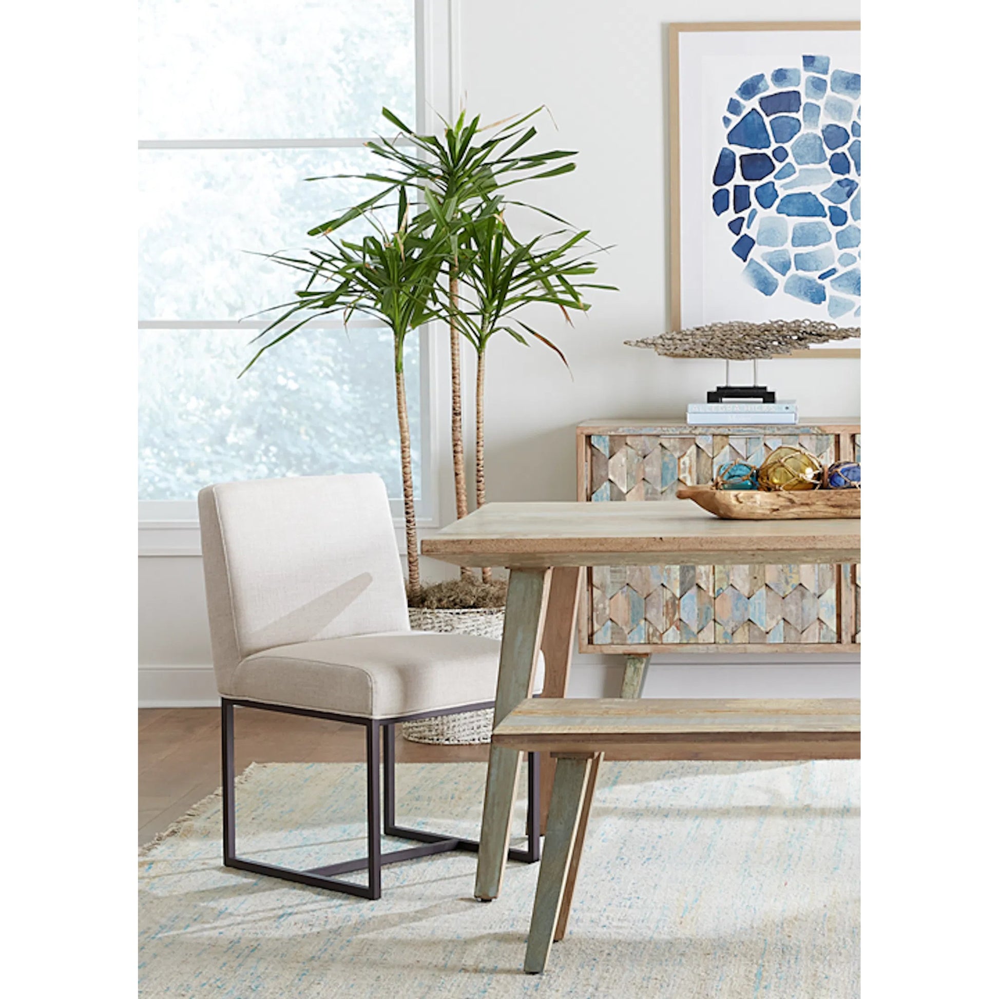 Rebel Dining Chair by World Interiors in off-white and antique zinc. Made from linen, cotton, polyester blend fabric, foam, iron, birch wood in a unique style.