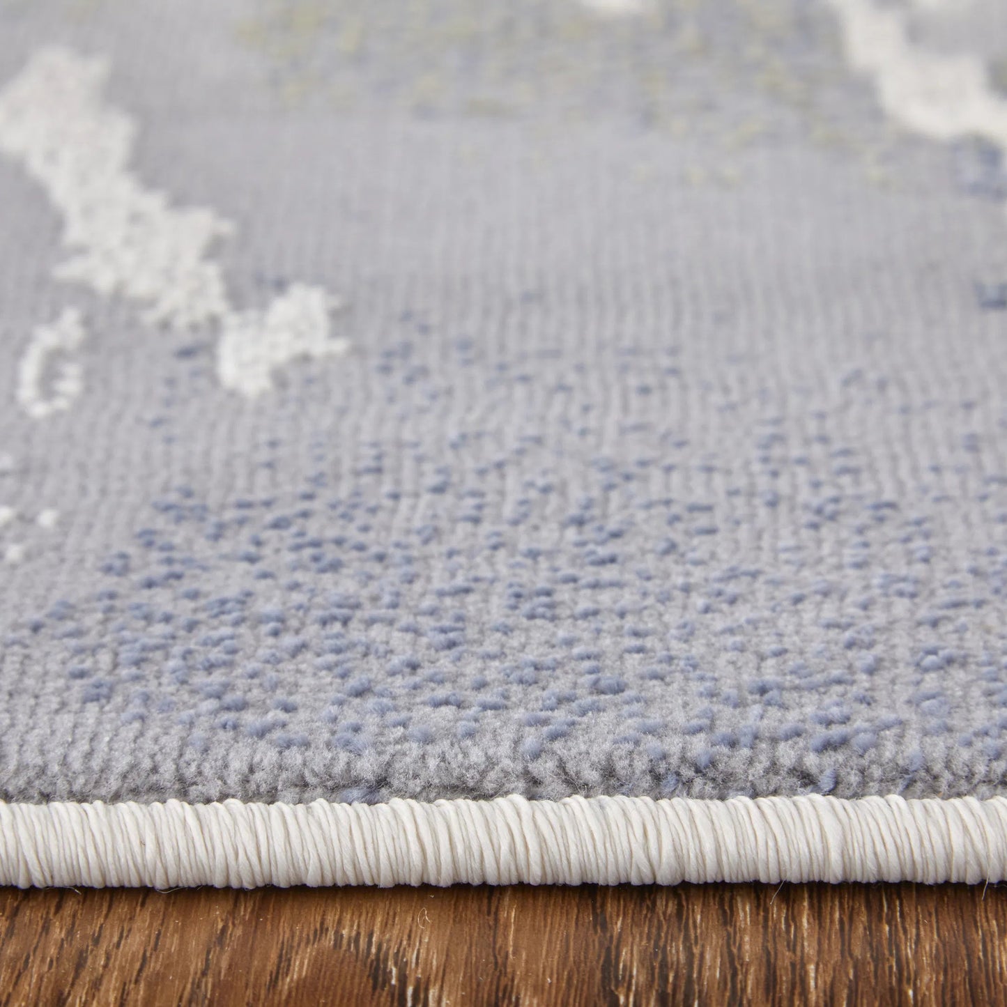007 SI-2518385,SI-2518386 | Closeup | Mandana CME39M0F Rug by Feizy in ivory, blue. Made from polyester, polypropylene in a unique style.
