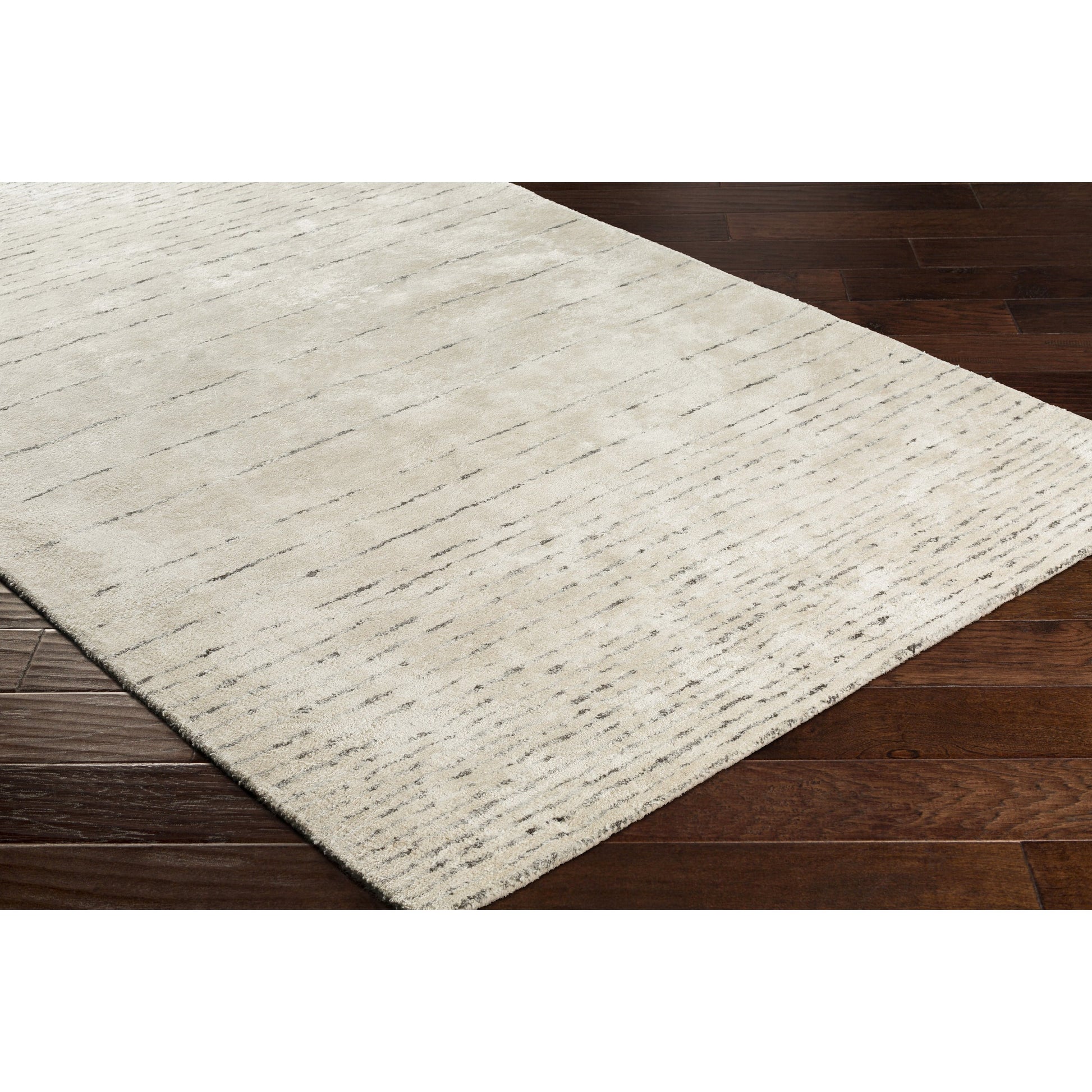 Falcon Rug - 23127 by Surya in dark brown. Made from 70% viscose, 30% wool in a unique style.