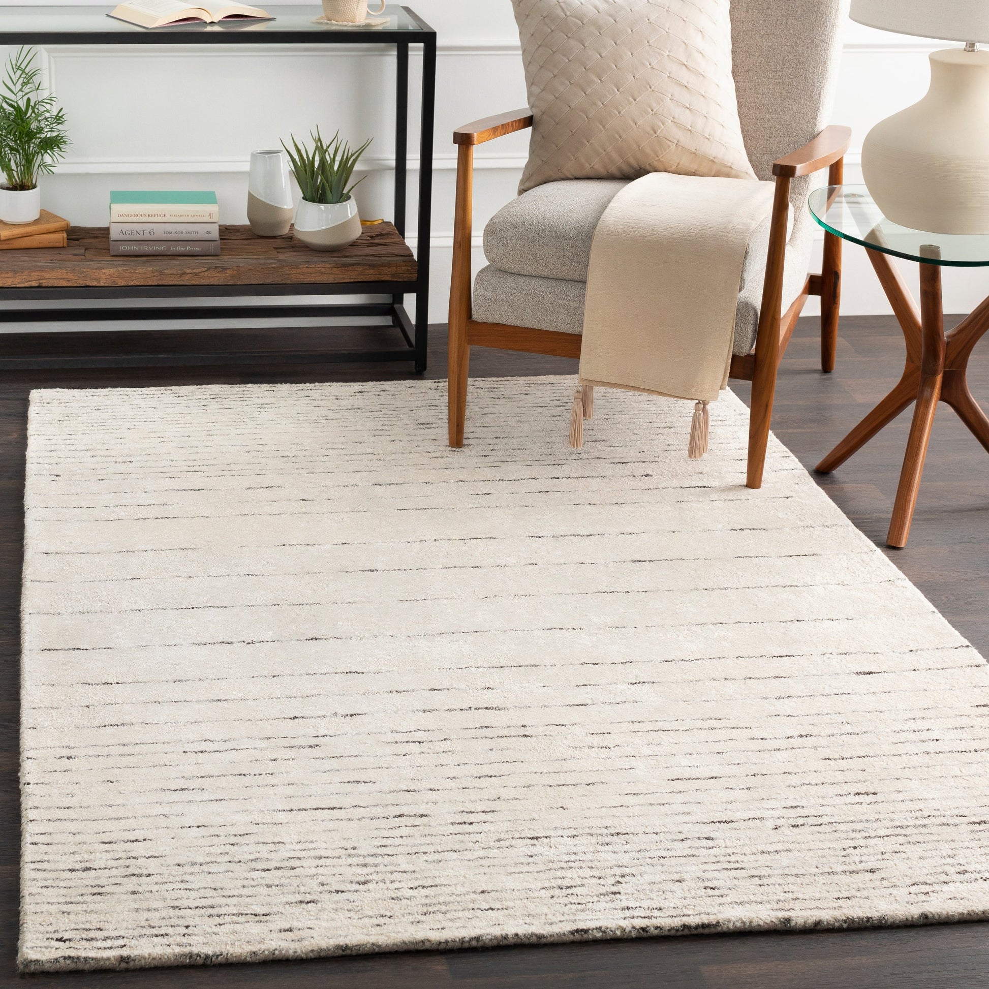 Falcon Rug - 23127 by Surya in dark brown. Made from 70% viscose, 30% wool in a unique style.