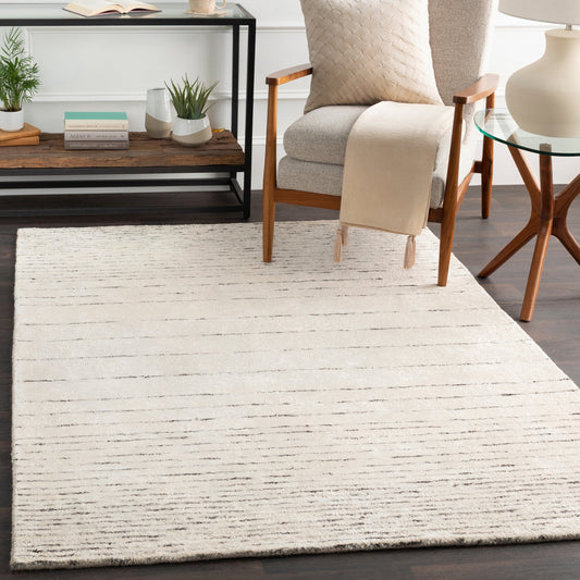 Falcon Rug - 23127 by Surya in dark brown. Made from 70% viscose, 30% wool in a unique style.