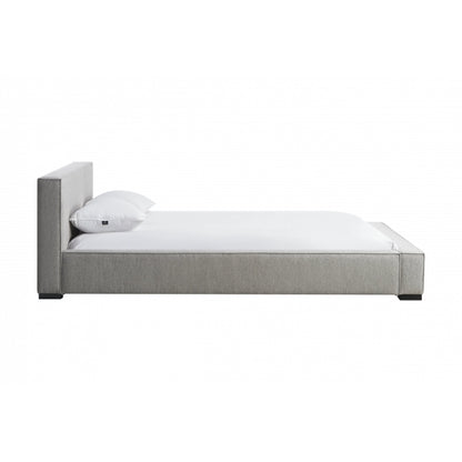 Zest Wide Upholstered Bed by Zest. Made from rubberwood, fabric in a modern style.