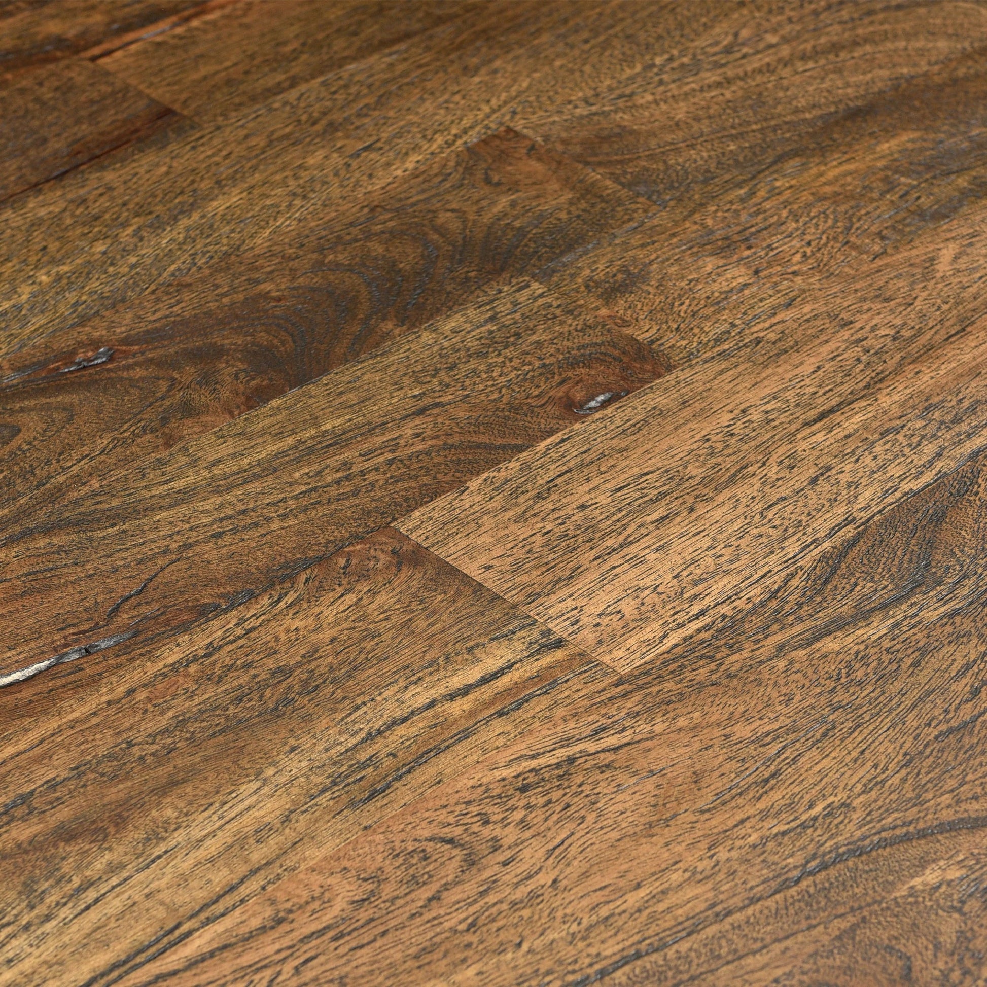 Toulon Weathered Mango Dining Table by World Interiors in weathered mango. Made from mango wood in a traditional style.