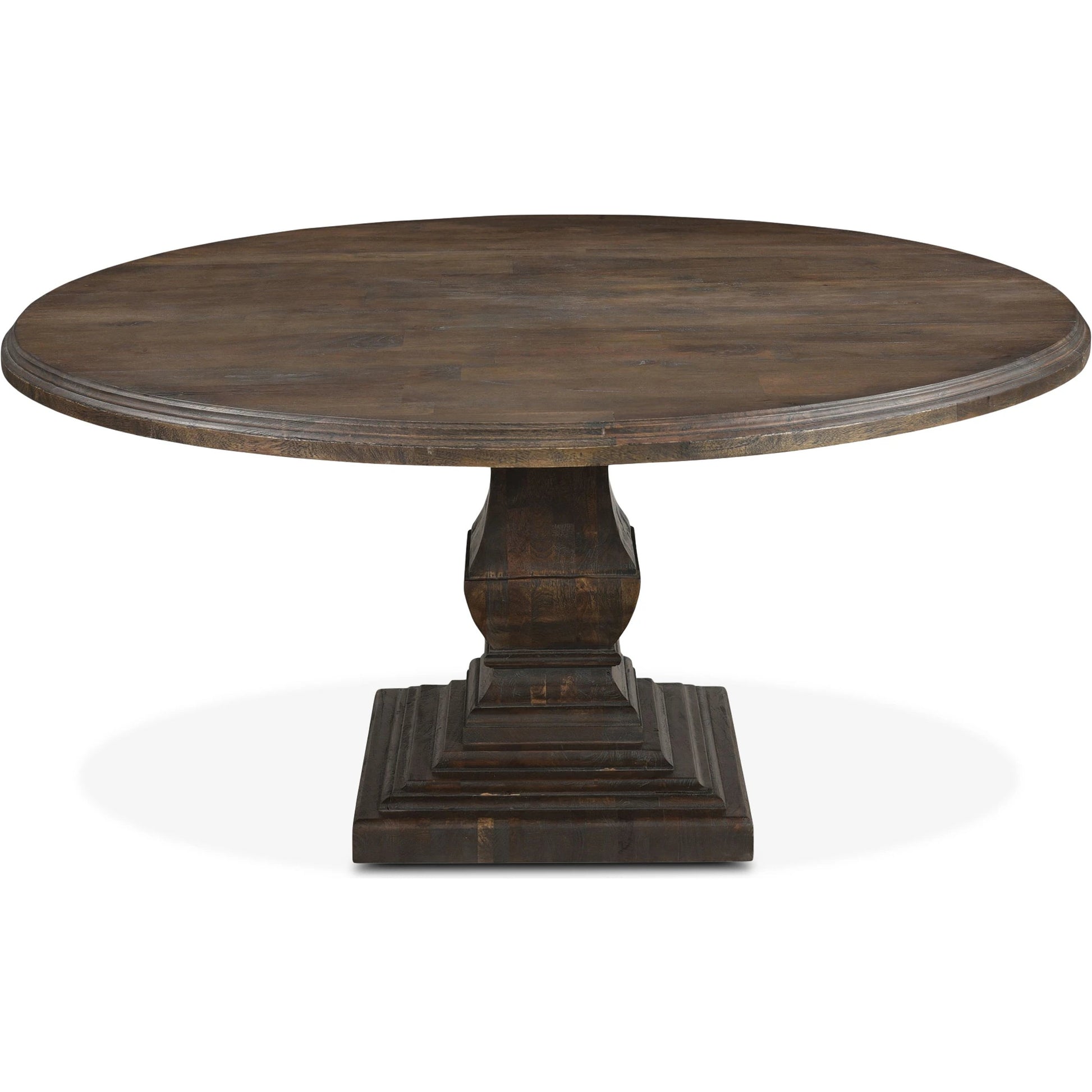 Toulon 60" Round Dining Table by World Interiors in weathered mango. Made from mango wood in a traditional style.