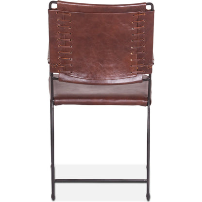 Melbourne Dining Armchair by World Interiors in dark brown and black. Made from reclaimed iron, leather in a modern style.