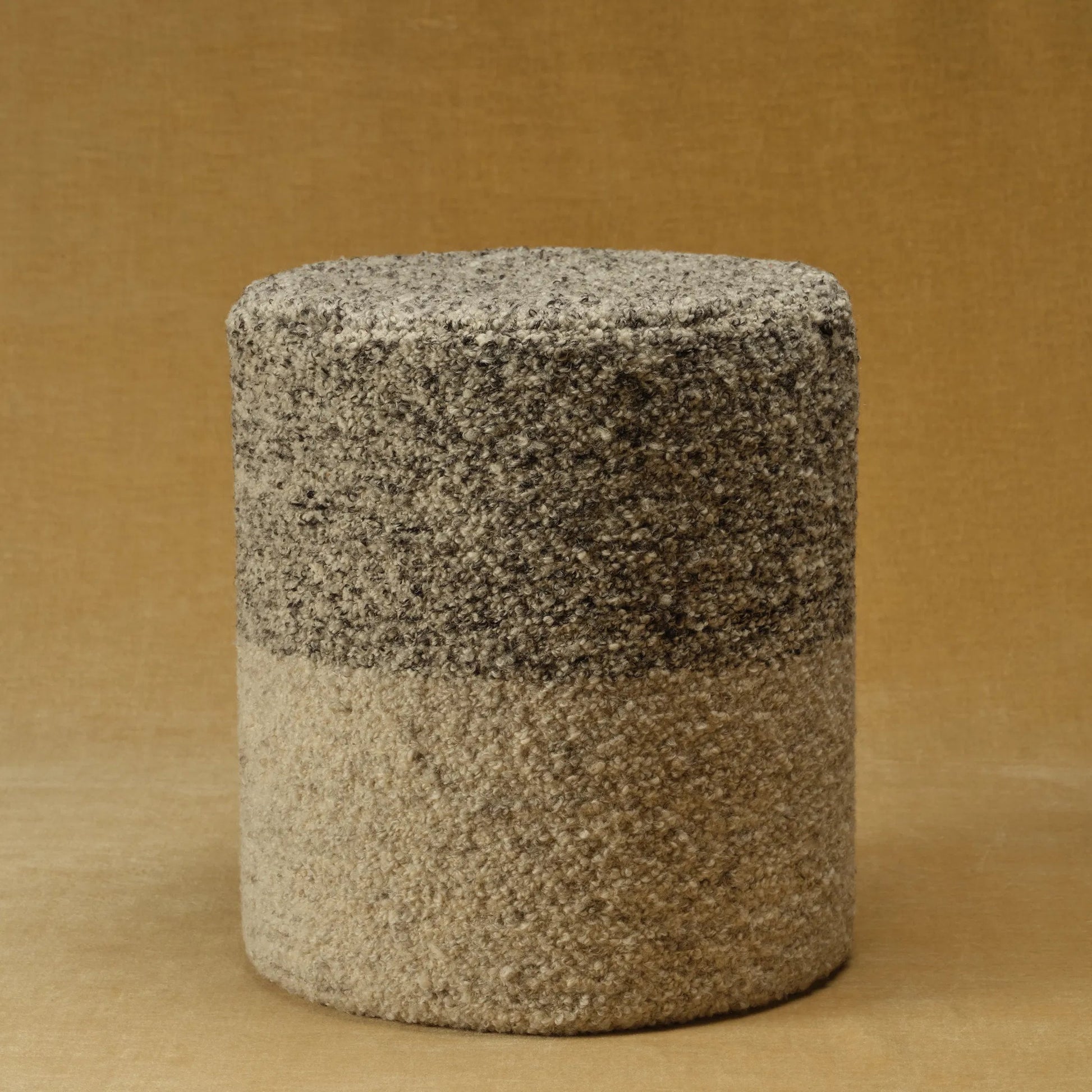 Folke FOL01 Pouf by Jaipur Living. Made from 100% wool in a modern style.