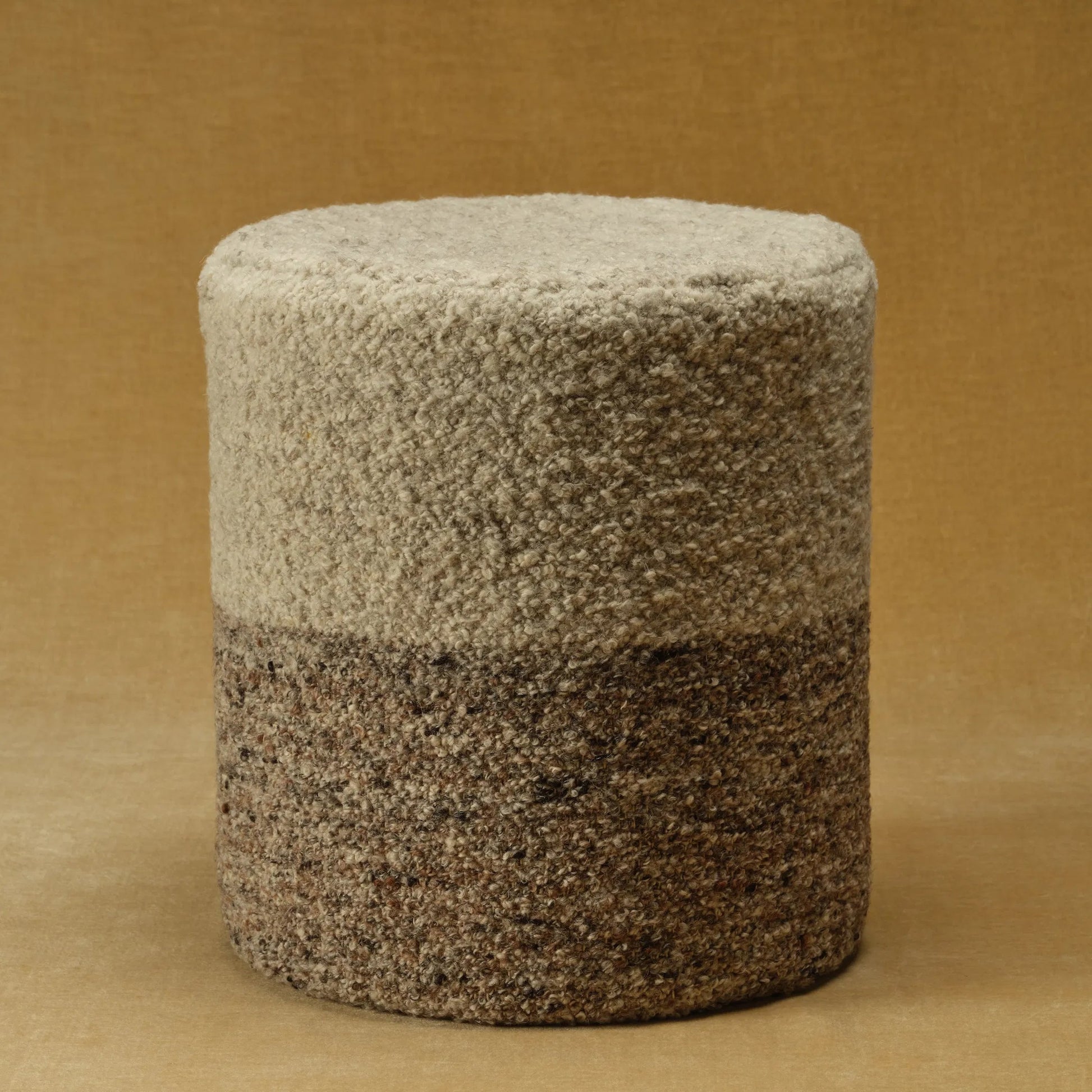 Folke FOL01 Pouf by Jaipur Living. Made from 100% wool in a modern style.