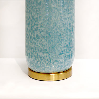 Tucson Table Lamp by Pasargad Home in gold and blue. Made from ceramic in a coastal style.