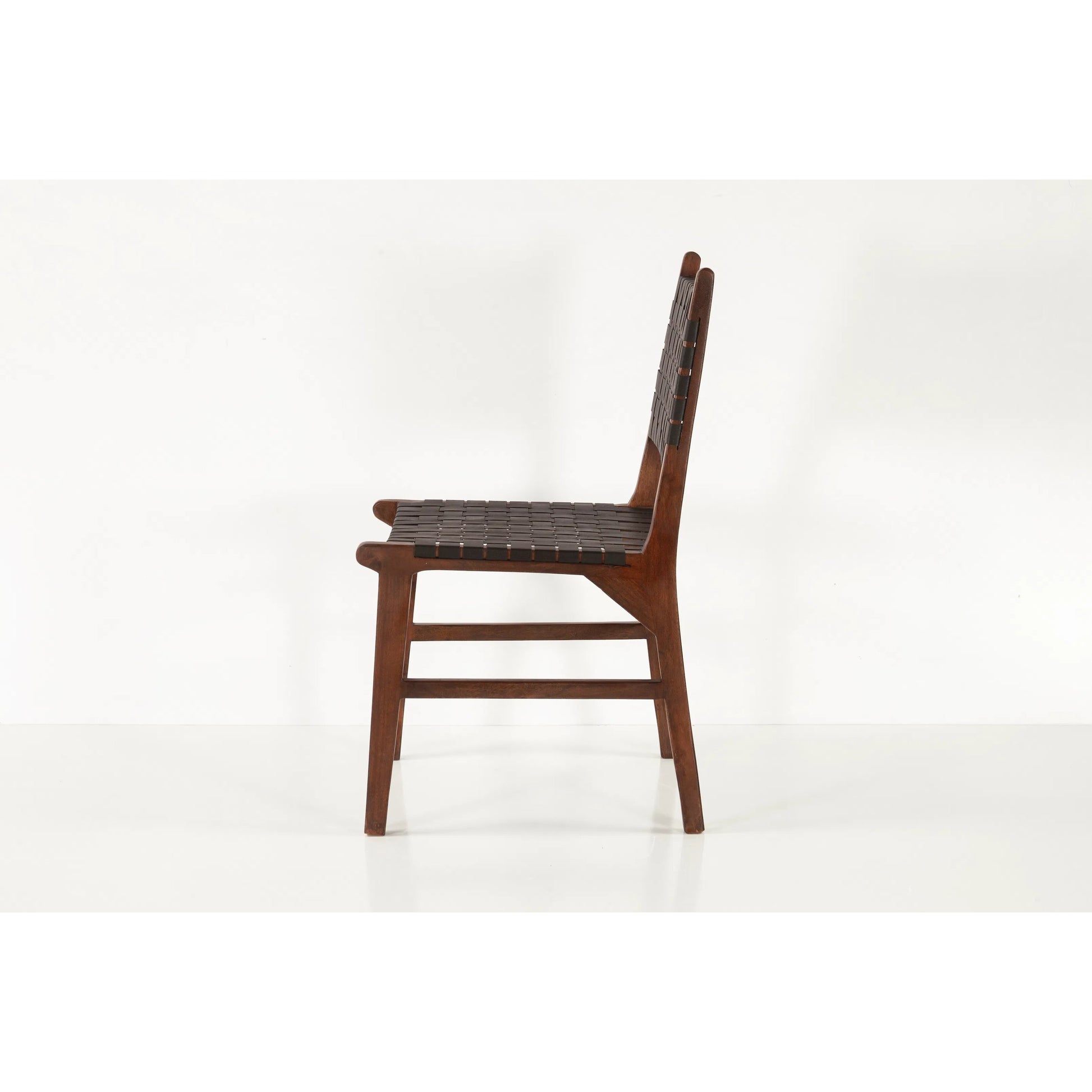 Lisbon Dining Chair by World Interiors in black, royal brown. Made from mango wood, leather in a coastal style.