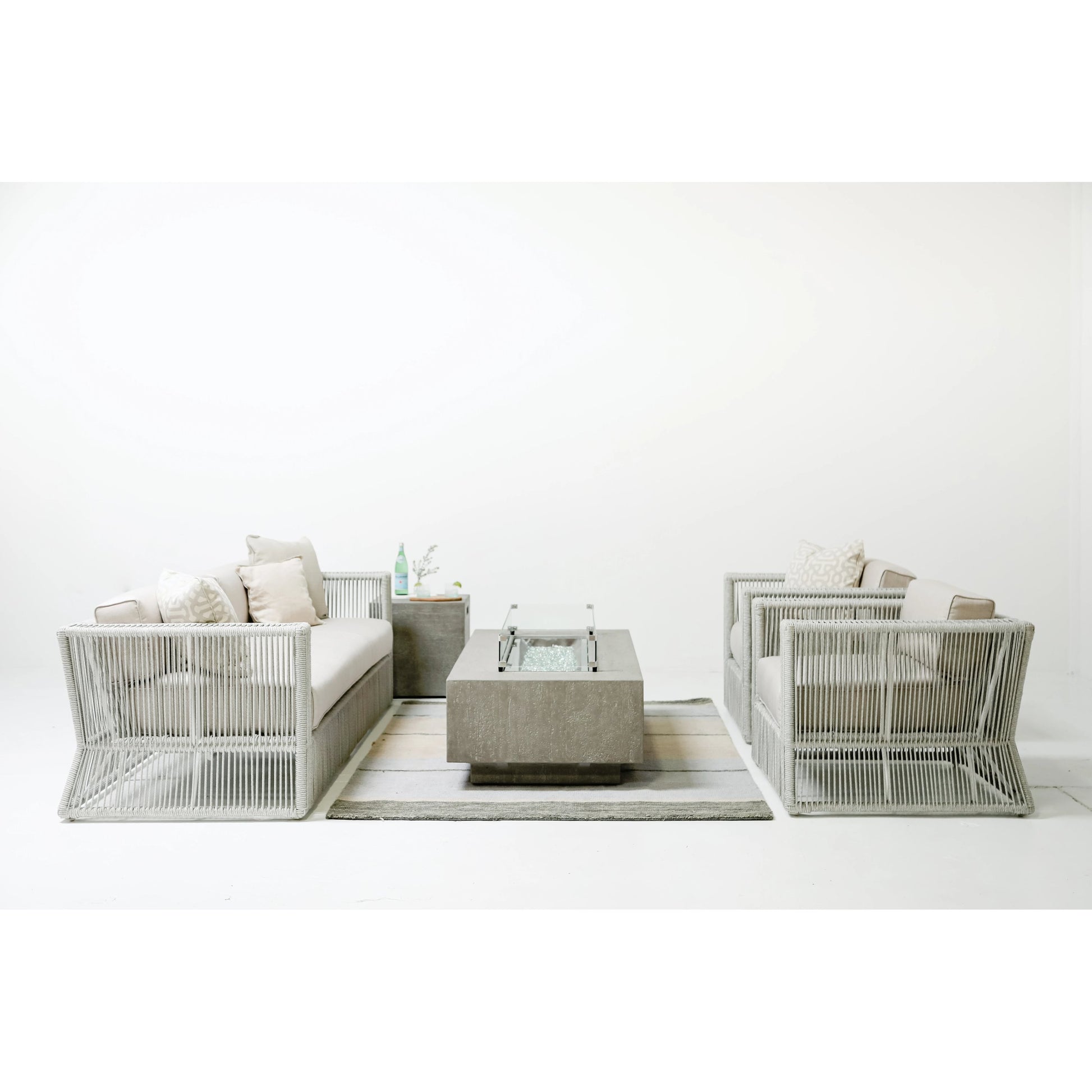 Miami Outdoor Club Chair by Sunset West in frost. Made from olefin rope in a coastal style.