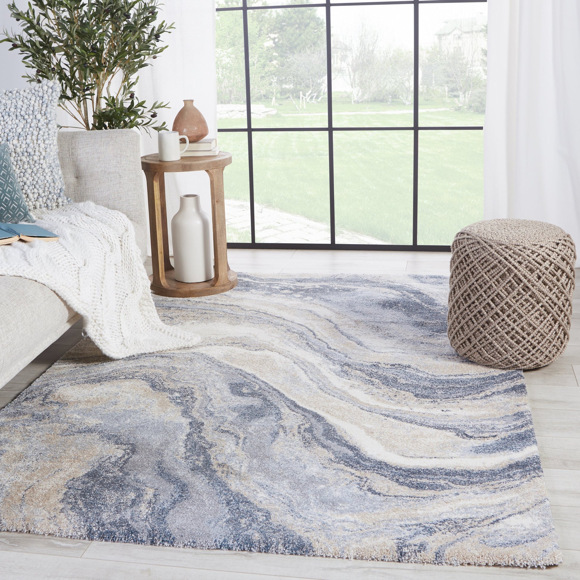 Ferris FRR07 Rug by Jaipur Living in blue, light gray. Made from 70% polypropylene 30% polyester in a unique style.