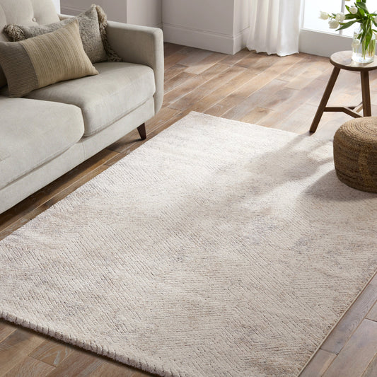 Ferris FRR13 Rug by Jaipur Living in cream, silver. Made from 70% polypropylene 30% polyester in a unique style.