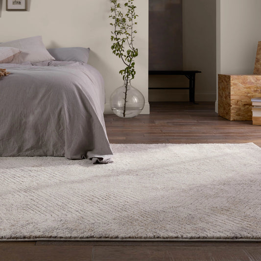 Ferris FRR13 Rug by Jaipur Living in cream, silver. Made from 70% polypropylene 30% polyester in a unique style.