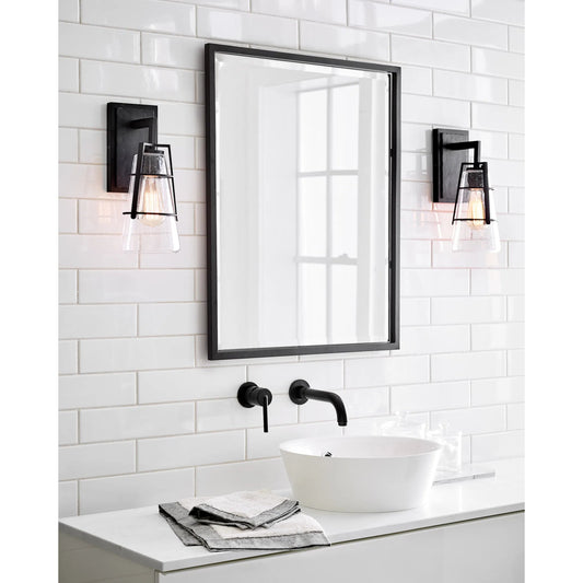 Adelaide Wall Sconce by Generation Lighting in midnight black. Made from steel in a modern style.
