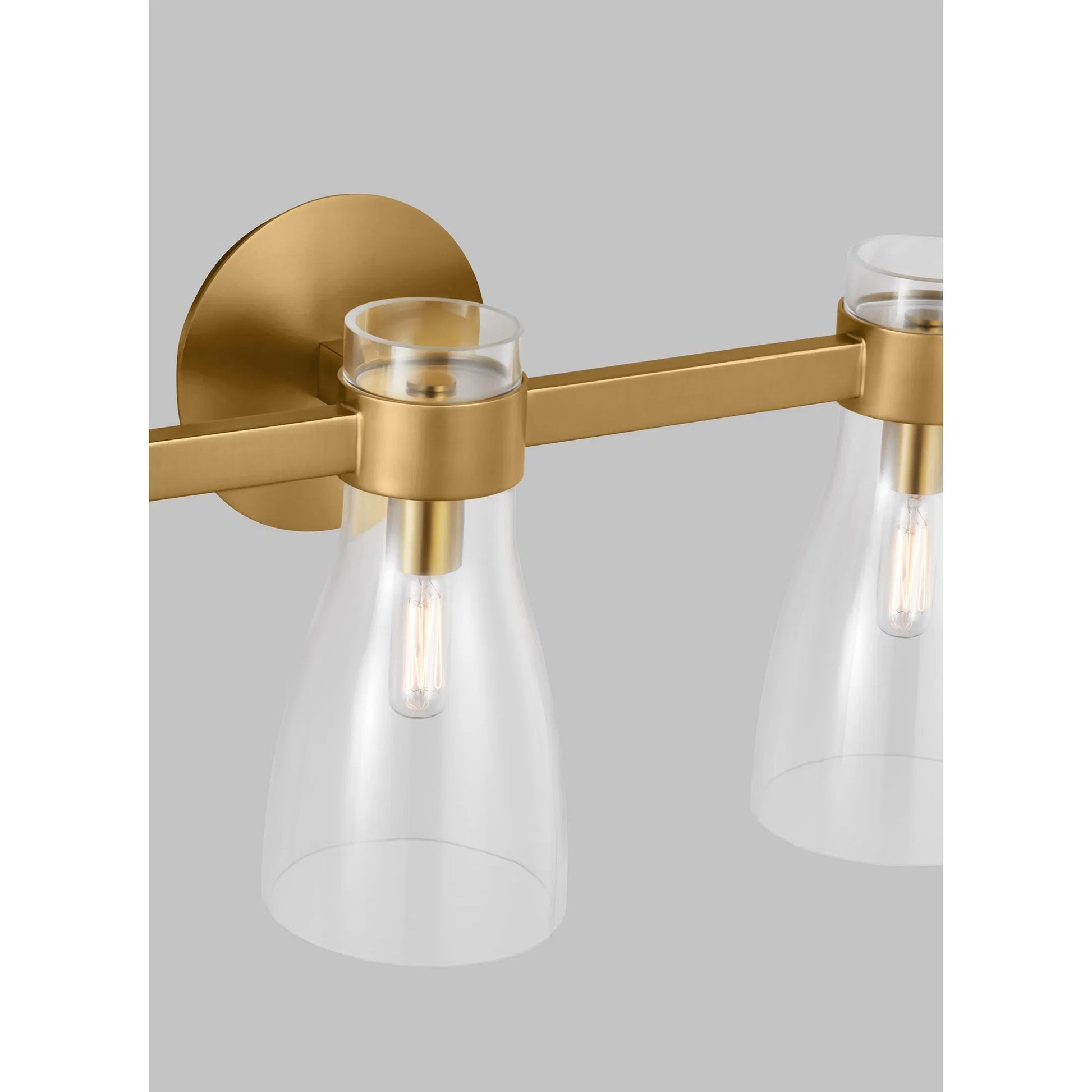 Moritz Three Light Vanity by Visual Comfort & Co. in polished nickel. Made from steel in a modern style.
