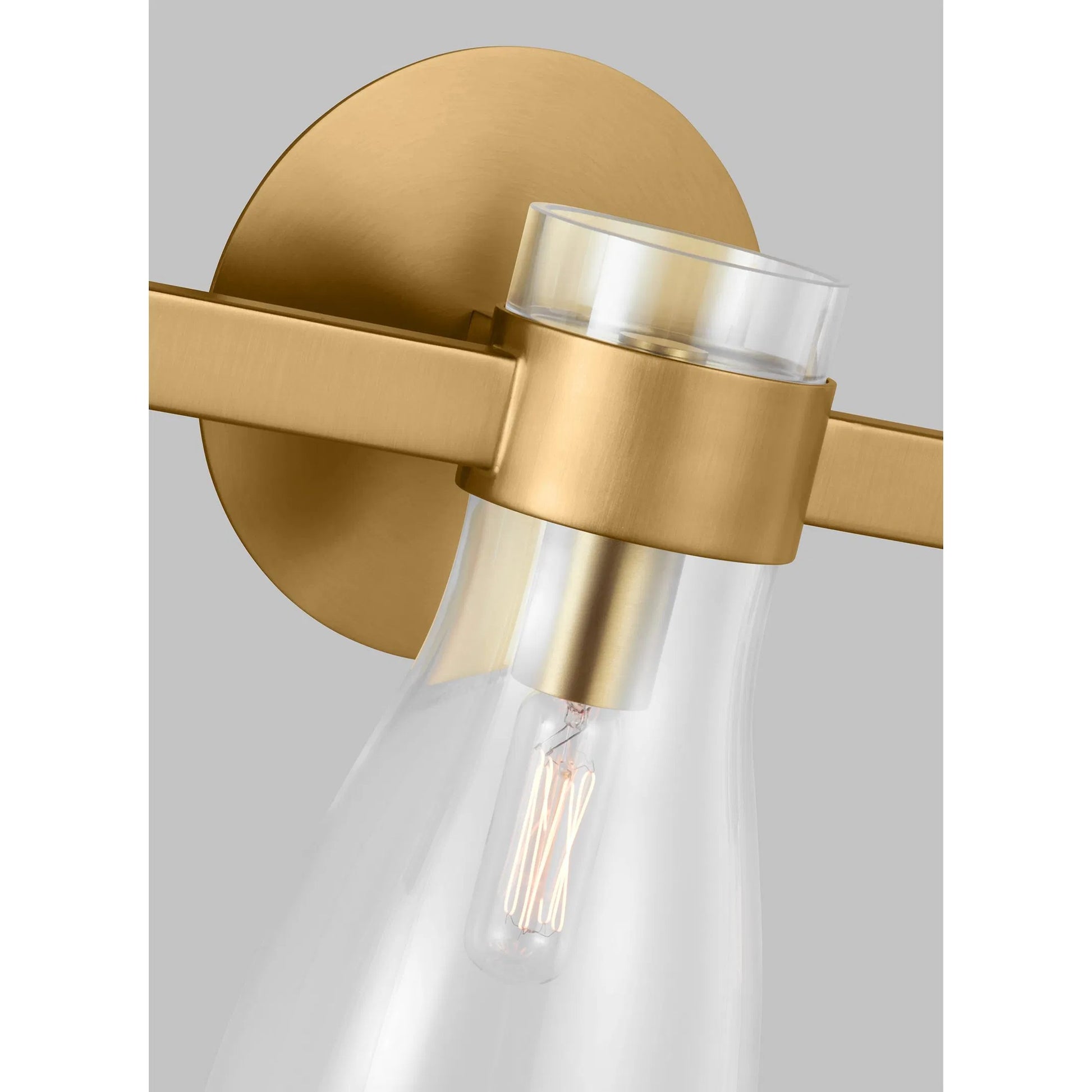 Moritz Three Light Vanity by Visual Comfort & Co. in polished nickel. Made from steel in a modern style.