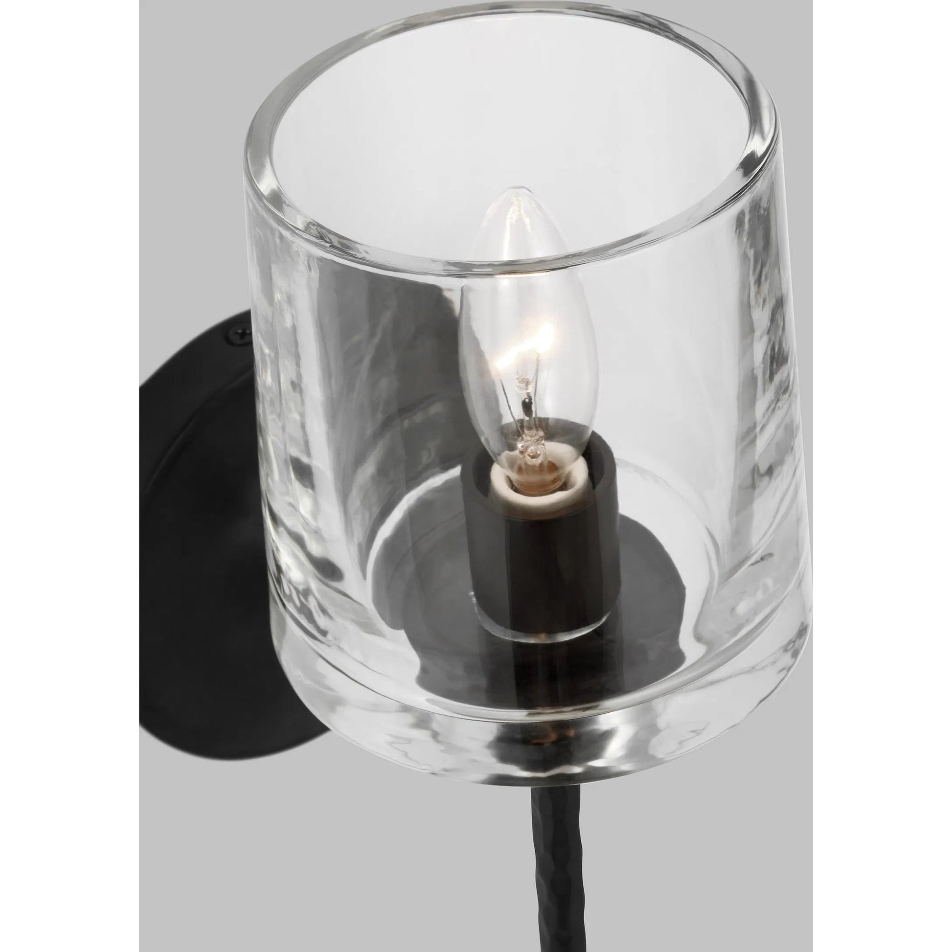 Marietta Sconce by Visual Comfort & Co. in aged iron. Made from steel in a unique style.