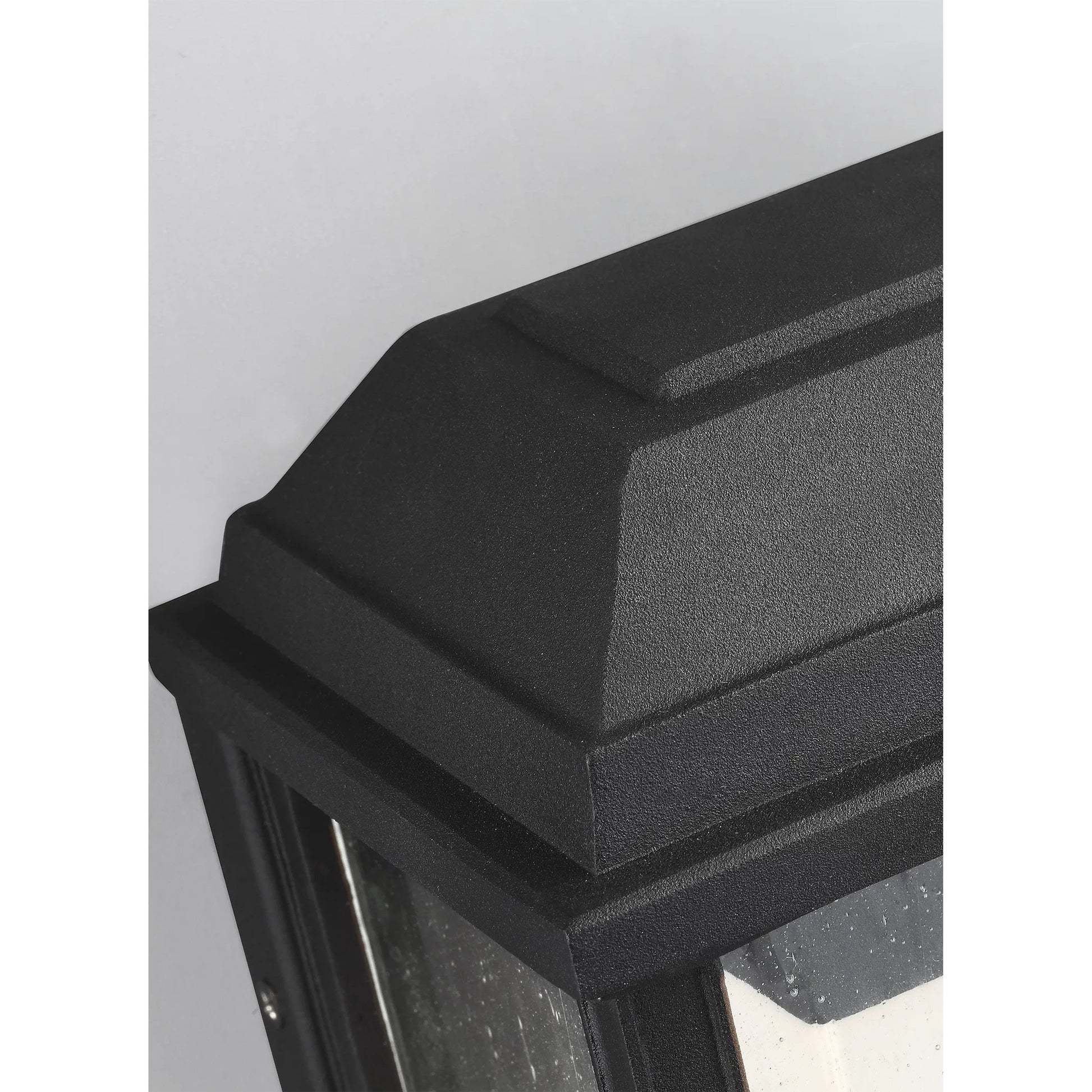 McHenry Small LED Lantern by Visual Comfort & Co. in textured black. Made from stonestrong in a unique style.