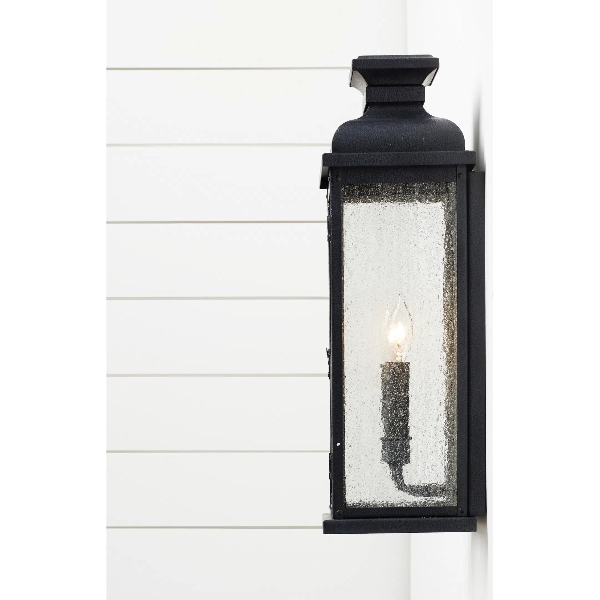 Pediment Outdoor Sconce by Generation Lighting in dark weathered zinc. Made from stainless steel in a traditional style.