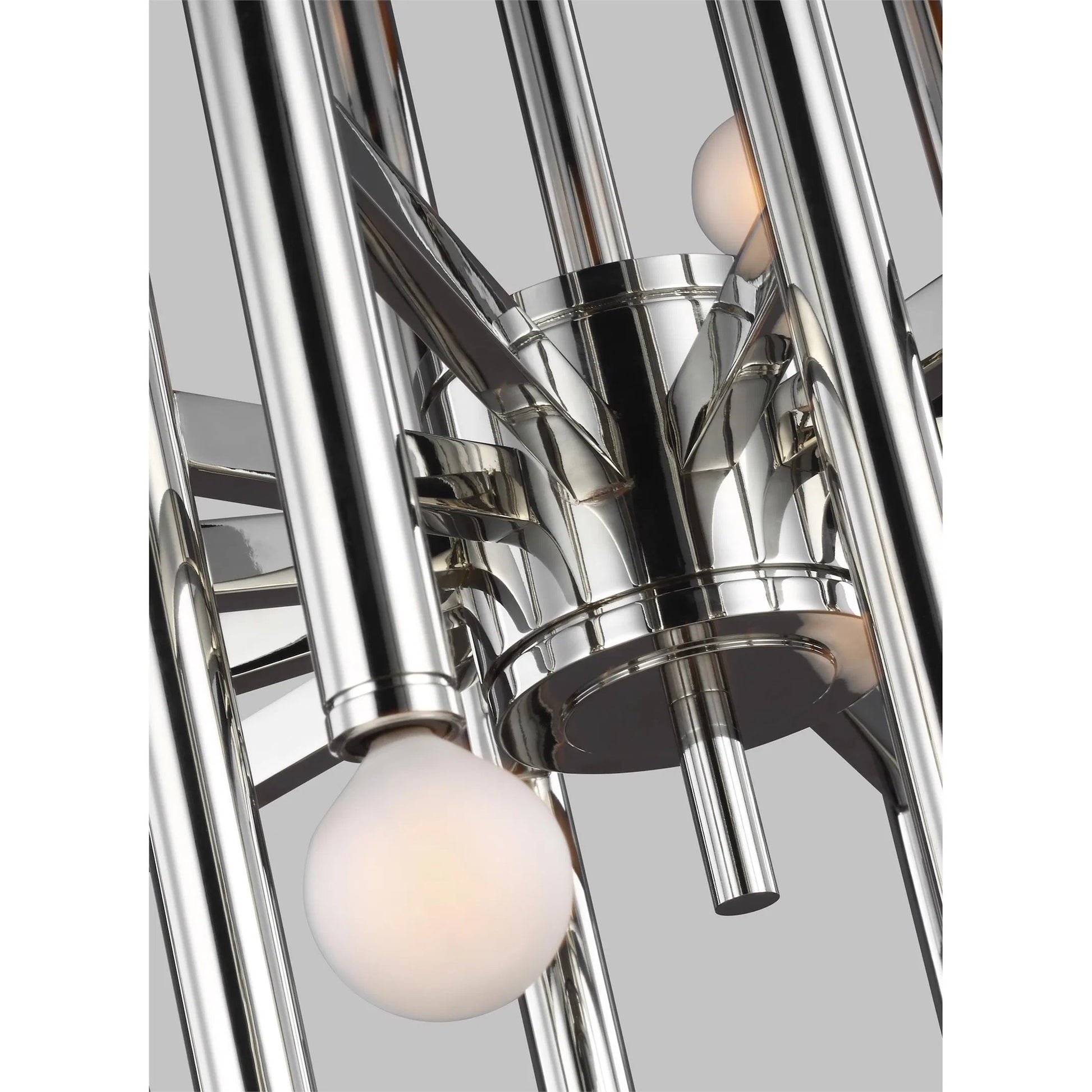 Beckham Modern Medium Chandelier by Visual Comfort & Co. in burnished brass. Made from steel in a unique style.