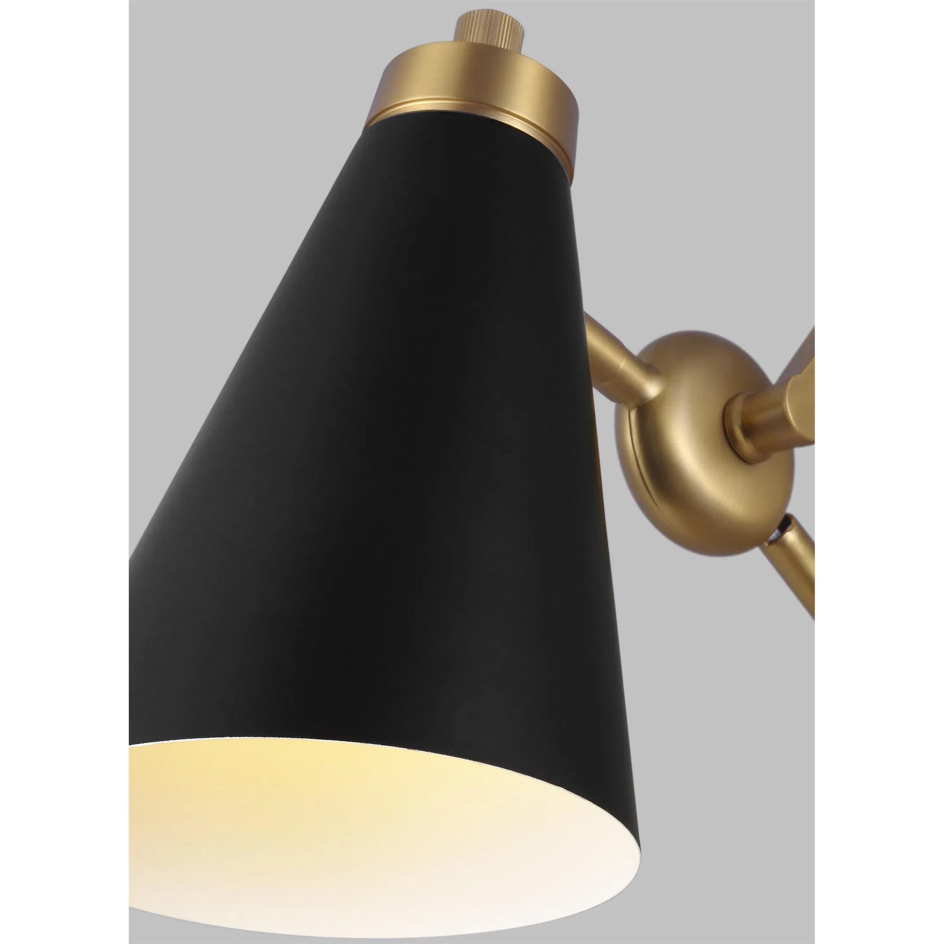 Signoret Library Sconce by Visual Comfort & Co. in burnished brass. Made from steel in a unique style.