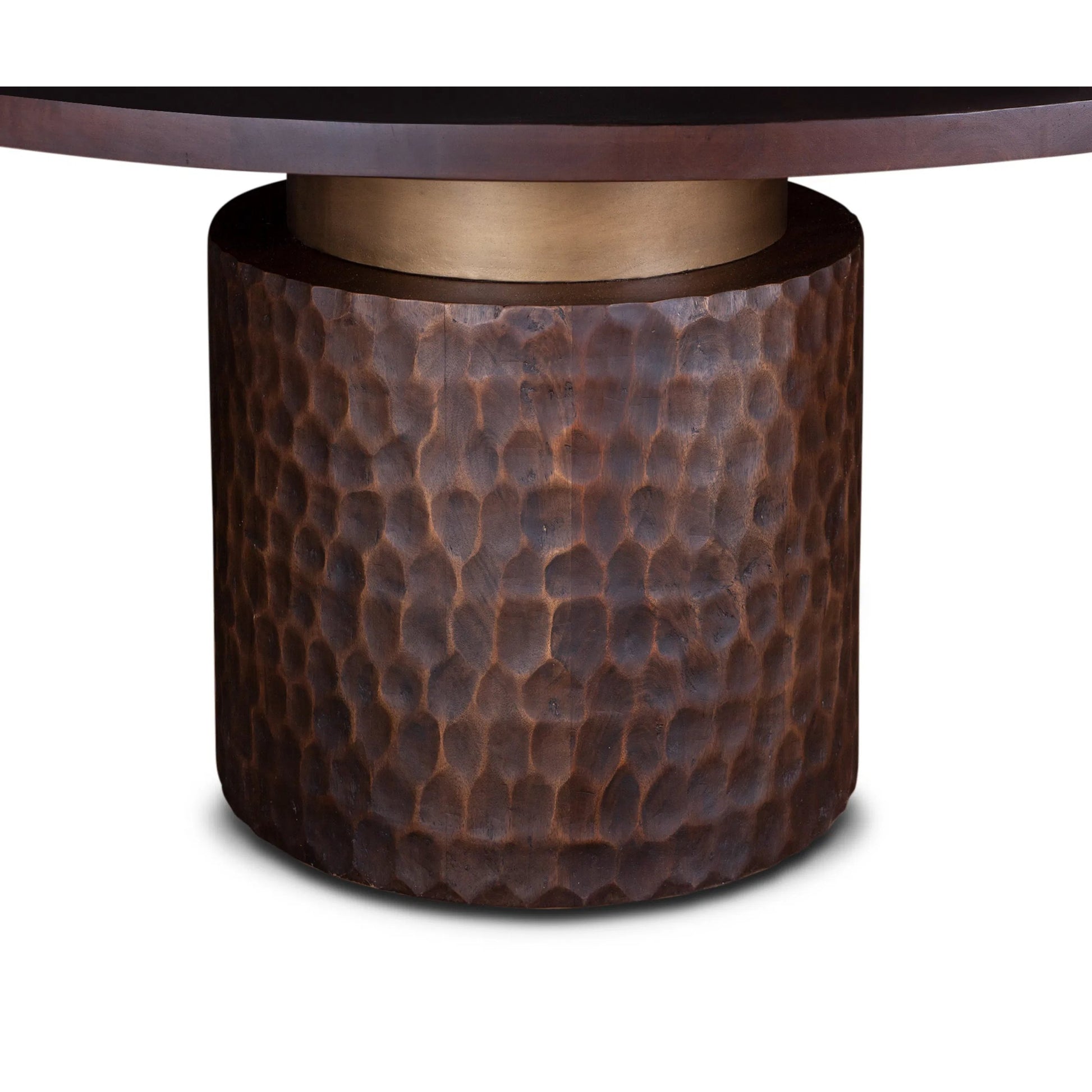 Vallarta Carved Wood Round Dining Table by World Interiors in bronze, gold and two toned bronze. Made from mango wood, cast aluminum in a eclectic & global style.