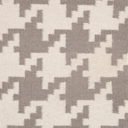 Frontier Rug - 76 by Surya in brick brown. Made from 100% wool in a unique style.