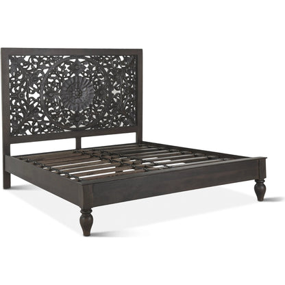 Haveli Carved Bed by World Interiors in brown and vintage brown. Made from mango wood in a eclectic & global style.