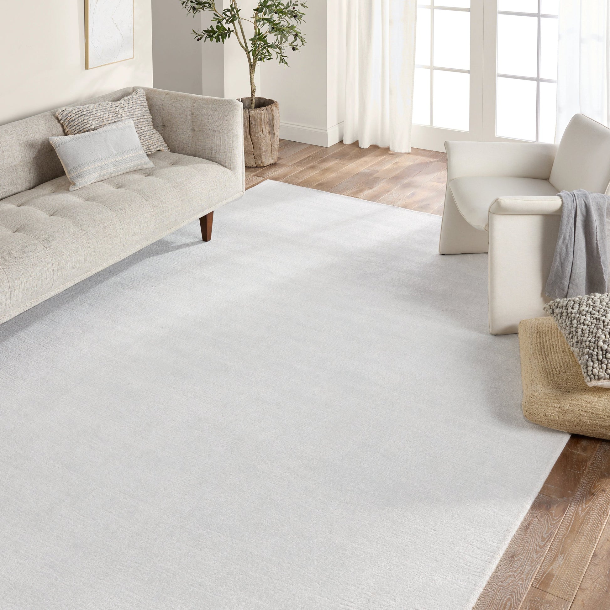 Fletcher Arcus FTR06 Rug by Jaipur Living in ivory. Made from 100% pet yarn in a unique style.