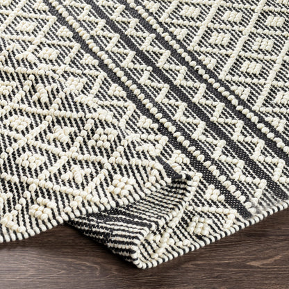 Farmhouse Tassels FTS-2300 Rug by Livabliss in black, white. Made from 60% wool, 40% cotton in a unique style.