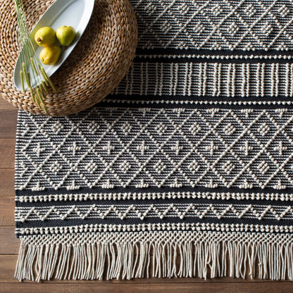 Farmhouse Tassels FTS-2300 Rug by Livabliss in black, white. Made from 60% wool, 40% cotton in a unique style.