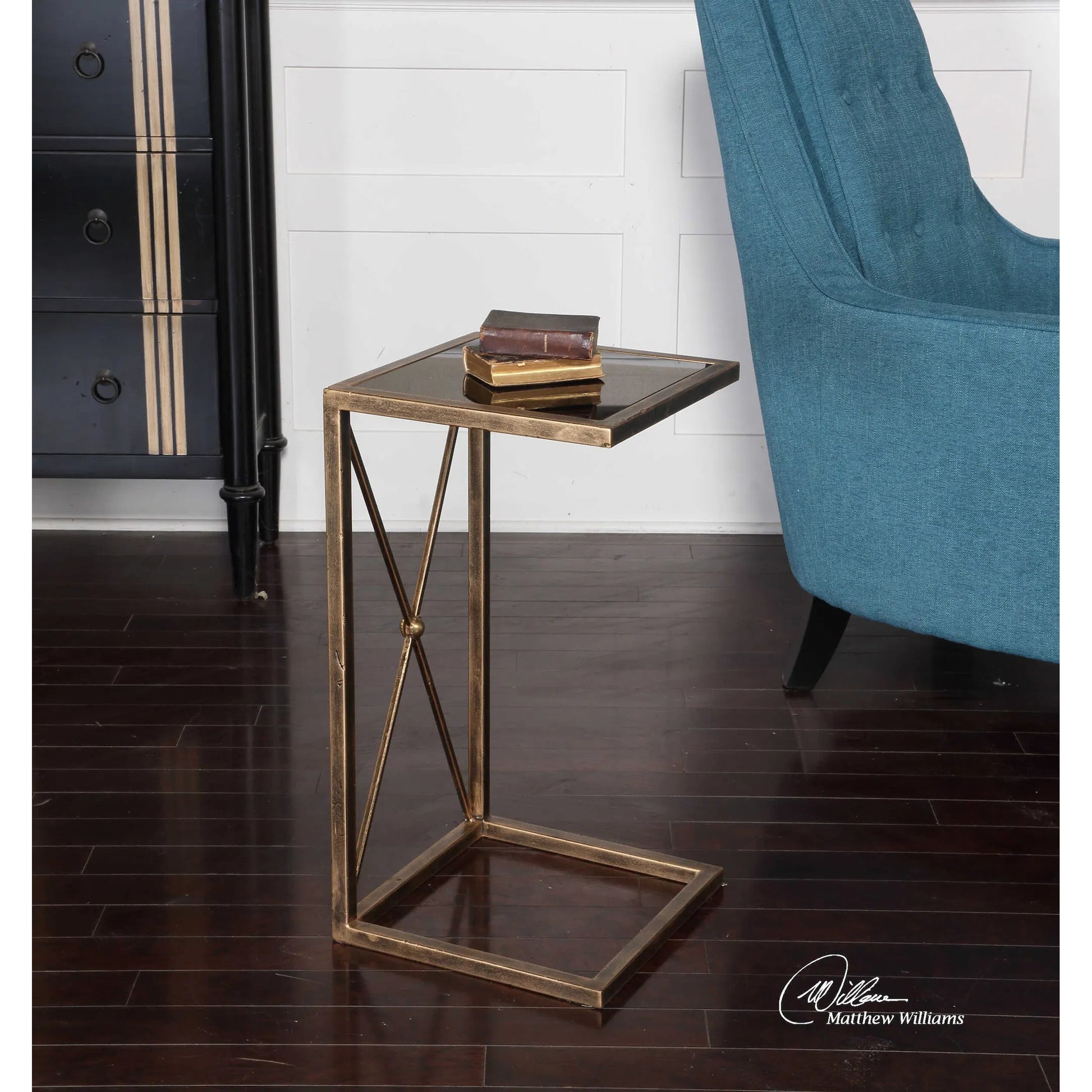 Zafina Side Table by Uttermost in gold. Made from iron, glass in a modern style.
