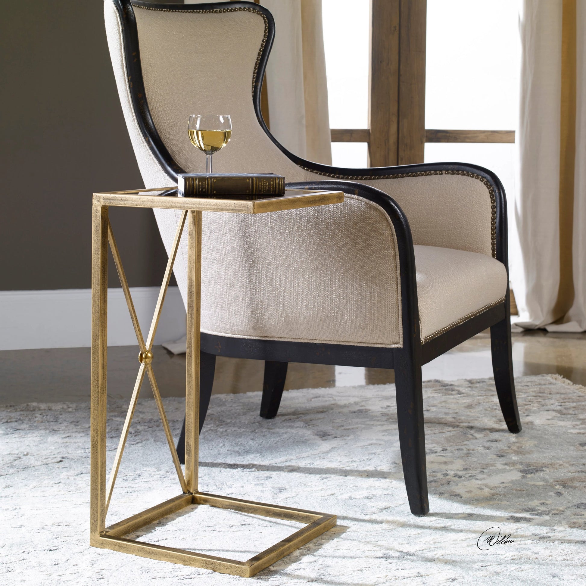 Zafina Side Table by Uttermost in gold. Made from iron, glass in a modern style.