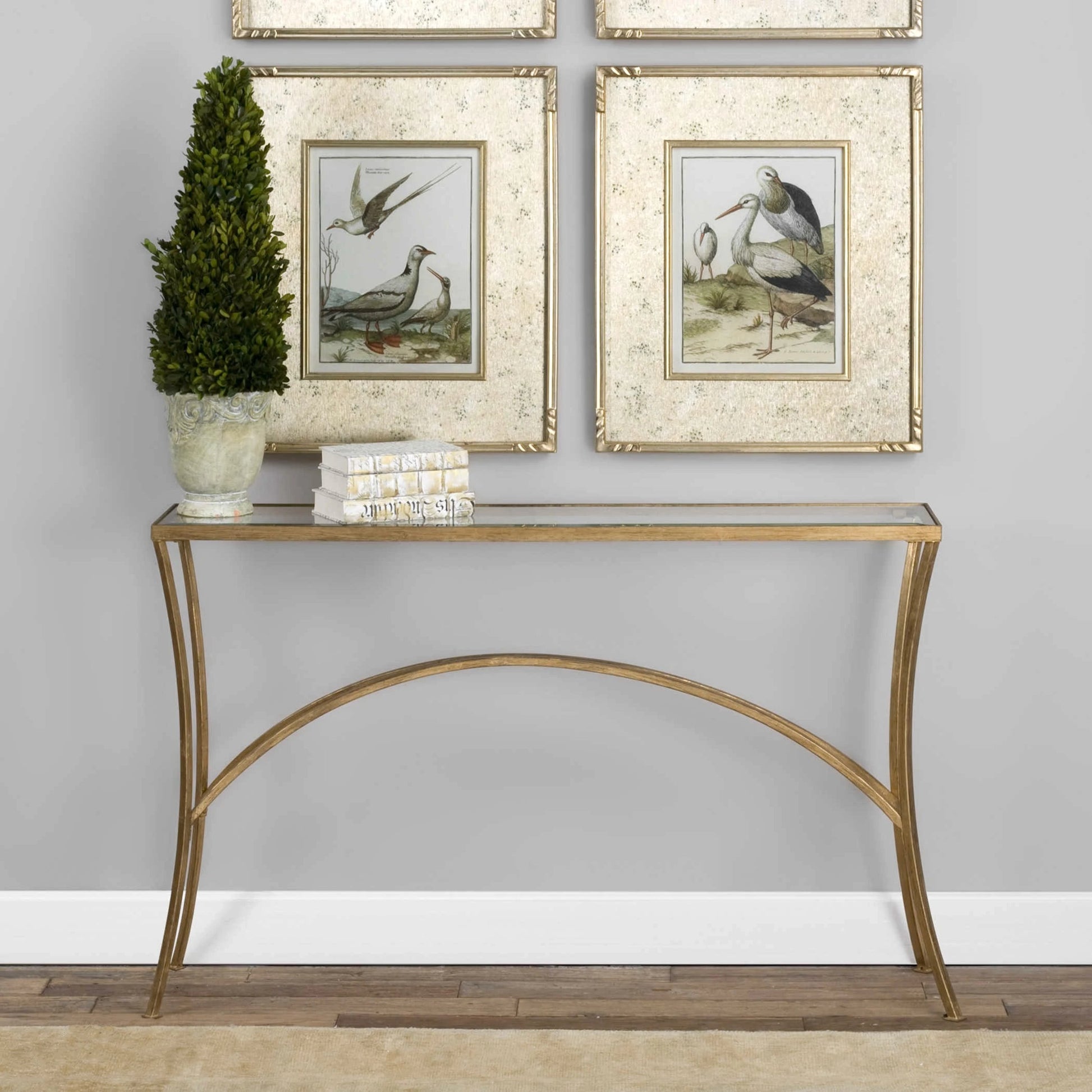 Alayna Console Table by Uttermost in black. Made from metal, tempered glass in a modern style.