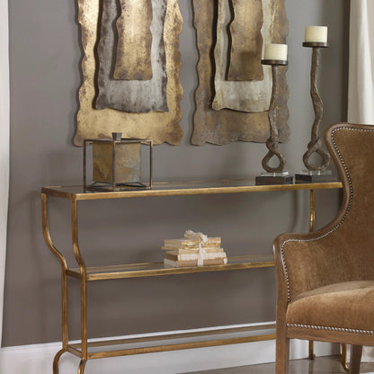 Deline Console Table by Uttermost in gold. Made from iron, glass in a modern style.