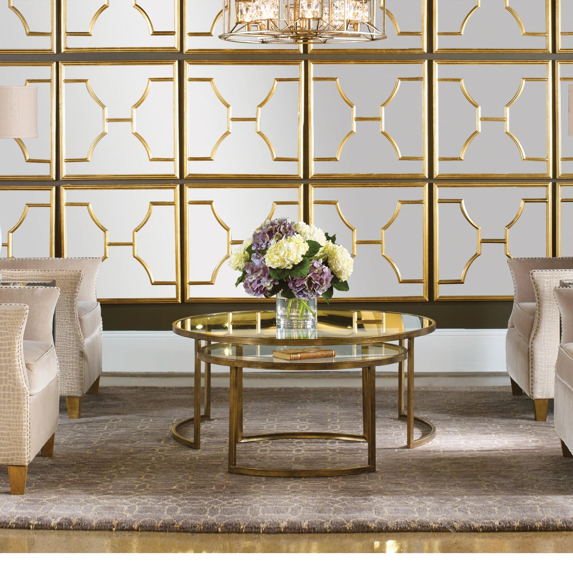 Rhea Nested Coffee Tables (Set of 2) by Uttermost. Made from metal, glass in a modern style.