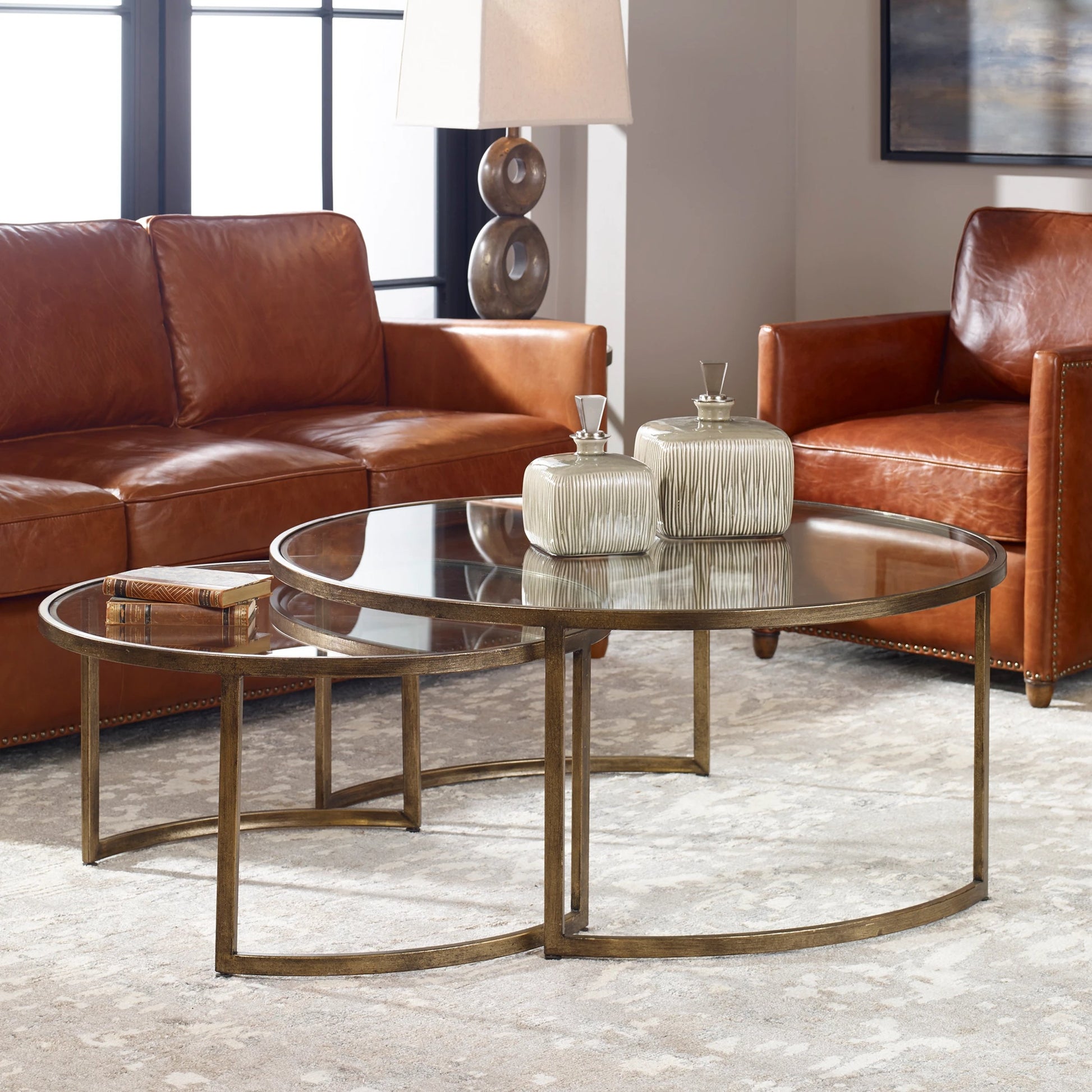 Rhea Nested Coffee Tables (Set of 2) by Uttermost. Made from metal, glass in a modern style.